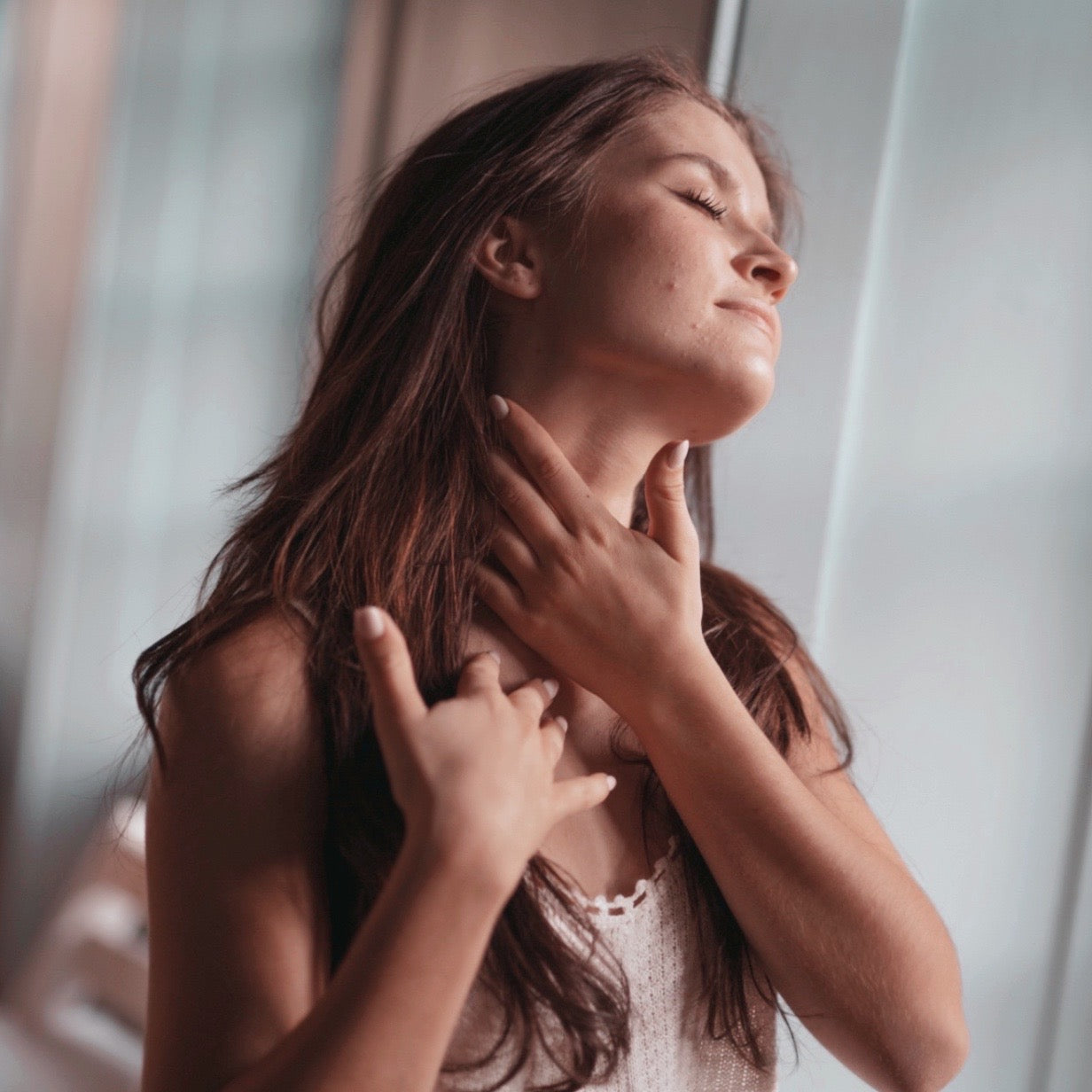 girl using intention oil on her body for relaxation and mindfulness
