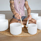 Set of 7 White Crystal Singing Bowls in Beige Bags
